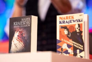 Dwa kryminały Marka Krajewskiego na stole.